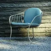 Distinctive Royal Botania Folia lounge chair with light blue woven textile and matte metal framing