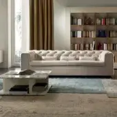 Timeless 4 Mariani Tudor sofa in light textile with classic diamond-tufted detailing and soft padding
