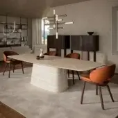 Distinguished Cattelan Italia Napoleon table with a light stone-like ceramic top and base exhibiting graceful curved shapes