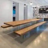 Exceptional Lago Air bench with a warm medium-brown oak wood seat and clear tempered-glass supports crafted in Italy with a matte finish