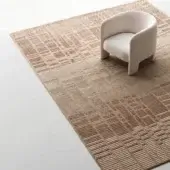 Exceptional Ditre Italia Hertz rug with alternating light and dark brown stripes woven in wool exhibiting a three-dimensional effect