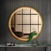 Superior Lago Kibi mirror with circular form and textured golden frame built with XGlass finish emitting soft lighting
