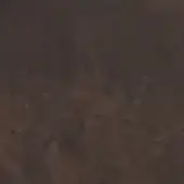 Mottled brown texture with matte finish, displaying a weathered pattern and depth; “ma17 ossido burno” text visible in corner.