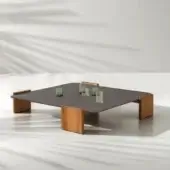 Superior Ditre Italia Tao coffee table with dark gray HPL top and shaped Iroko wood base in a natural finish