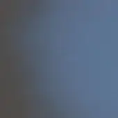 Gradient background, dark gray to medium and light blue, granular texture, matte finish, even lighting, subtle color transition, cool tones.