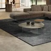 Distinguished Lago Glenn rug crafted in Italy with durable technical materials and a gradient from dark to light gray finish