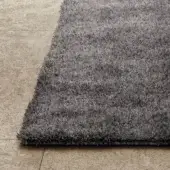 Distinguished Lago Kipo rug crafted with dense shaggy pile in varying gray tones and a matte finish
