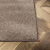 Superior Lago Diman rug with a mottled light and darker brown colorway crafted in Italy from advanced materials