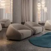 Exceptional LaCividina Apper lounge chair with unified form, matte beige textile upholstery and rounded silhouette