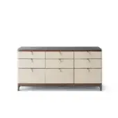 Exceptional OAK Saint Paul dresser with nine drawers accented in leather, showcasing a light beige body and dark gray top with splayed legs
