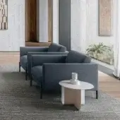 Elegant LaCividina Newtime lounge chair with dark blue textile upholstery and slim metal feet