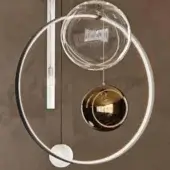 Chandelier, chrome and glass, circular frame with three suspended spheres: clear borosilicate, bronze frosted, and white frosted glass.