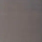 Monochromatic gray field with subtle gradient, smooth matte surface, even lighting, and simple abstract composition presenting a uniform tone.