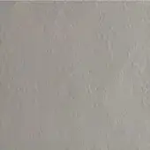 Gray stucco wall texture with granular surface and matte finish, displaying subtle shade variations under diffused, even lighting.