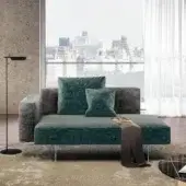 Innovative Lago Air lounge chair with teal and grey textile upholstery, glass legs, and grey backrests