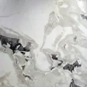 Marbled stone texture with creamy white, pale green, and beige swirling patterns, featuring dark gray and black inclusions and a polished finish.