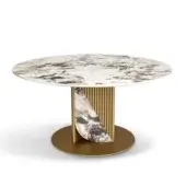 Distinguished Bizzotto Italia Pirouette table with gold tubular profiles and white marble-like tabletop exhibiting black, brown, grey veining