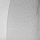Grayscale wall texture with curved edge, granular porous surface, uneven depth, shadowed three-dimensional effect, and stucco-like applied finish.