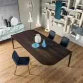 Distinguished Lago P&J table crafted in centenary oak with a matte Wildwood top and dark blue upholstered chairs with metal legs