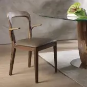 Elegant Pacini & Cappellini Gaya chair with comfortable padding in a medium brown textile and Canaletto walnut crafted with a smooth finish