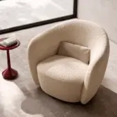 Distinguished CPRN Homood Isabel lounge chair with organic silhouette in light beige plush fabric and matte finish