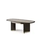 Expandable desk, dark brown lacquer, rounded rectangle top with gold legs; features central extension mechanism, model “ikat desk – model a”.