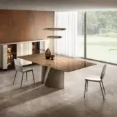 Architectural Lago Wadi rectangular table with golden-brown XGlass top and light beige matte base exhibiting a bold diagonal cut