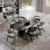 Distinguished Bizzotto Italia Ikat dining table with dark swirling wood grain and a monumental double-S base crafted in Italy