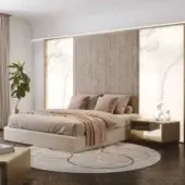 Refined Reflex Space XL bed with padded textile upholstery and MarmoReflex wings, complemented by a bronze finish frame