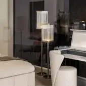 Distinguished Bizzotto Italia Ikat floor lamp with stacked design and 24KT gold galvanization built in sleek metal with clear bars
