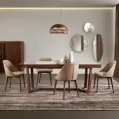 Distinguished Pacini & Cappellini Aliante table with veneered wood tabletop and geometric solid ash legs in a light finish