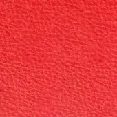 Red leather texture sample, Pacini & Cappellini Melograno 9017, displaying a granular, pebbled surface and matte finish.