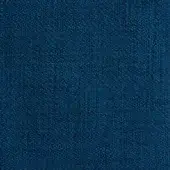 Deep blue granular texture fills the frame, displaying a consistent, pebbled pattern with subtle tonal shifts and a uniform, tactile quality.