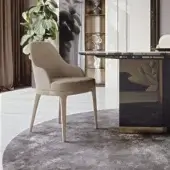 Elegant Bizzotto Italia Dune chair with light beige leather and lacquered metal legs crafted in a curved silhouette