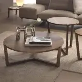 Distinguished Pacini & Cappellini Denny coffee table with a three-legged solid wood structure and veneered wood top in a medium-toned brown finish