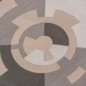 Jete Sound Table, engineered wood, circular geometric design featuring beige, gray, and charcoal segments with radiating angular extensions.