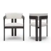 Distinguished Pacini & Cappellini Ines armchair with solid wood structure and light-colored fabric, showcasing a dark matte finish