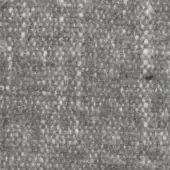 Gray tweed fabric texture with a speckled pattern, featuring small circular elements and a soft, matte, tightly woven surface.