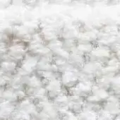 Fluffy white texture with brown and gray tones, layered organic material, fibrous elements, and diffused lighting on a light gray background.