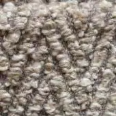 Dense looped textile texture in neutral beige, gray, and taupe tones with a nubby, three-dimensional, slightly ribbed surface pattern.