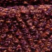 Irregular fibrous texture in reddish-brown and purple tones, displaying a dense, matted arrangement of shredded components against a dark background.