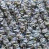 Textured composite surface with mottled gray, blue, beige, and brown tones displaying “formitalia > caraibi > – 78 –” markings.