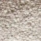 Granular texture sample, light beige and tan tones, mottled with brown and gray specks, matte finish, dense particle composition.