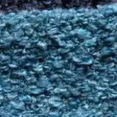 Irregular teal and turquoise texture composed of densely packed, rounded granules with subtle sheen and uneven topography.