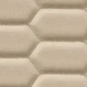 Beige leather texture with a hexagonal grid pattern, featuring matte finish and dark, precise stitching outlining each raised geometric shape.