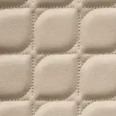 Beige leather texture with quilted rectangular grid pattern, defined by dark brown stitching and a subtle matte grain.