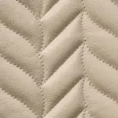 Beige leather texture with a diamond quilt pattern, featuring raised seams and a subtle sheen, demonstrating refined craftsmanship.