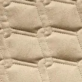 Quilted textile sample, light beige suede, rectangular grid pattern with tonal stitching detailing a subtle raised texture.