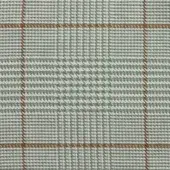 Green and white plaid textile with rust-orange grid lines, dense woven squares, matte finish; “formitalia” text visible.