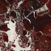 Rosso Levanto marble texture with deep burgundy and red tones, featuring extensive white veining and a polished, irregular surface.